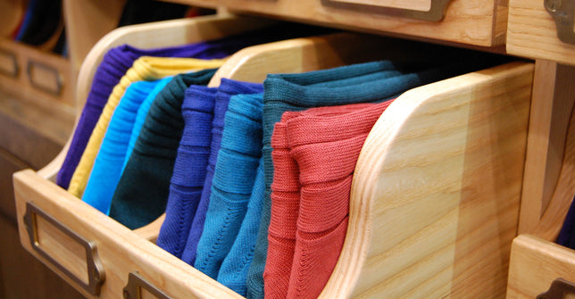 Colourful cotton socks in drawer
