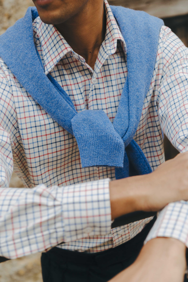 Close up of casual mens shirt on model with blue jumper over shoulders