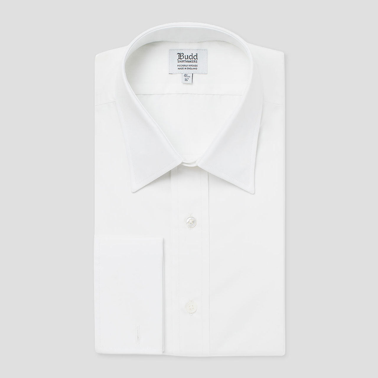 A white poplin shirt with a classic collar and double cuffs, shown flat.