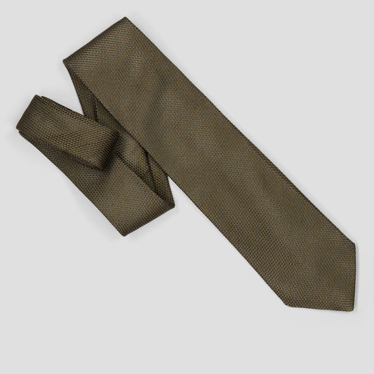 An olive green textured necktie with a woven pattern, styled in a knot and laid flat on a light gray background.