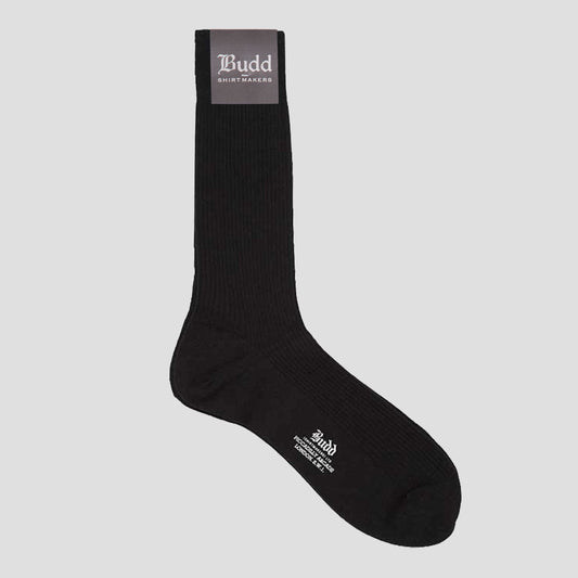 A single black crew sock with white printed branding and a gray cuff label, shown on a light gray background.