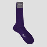 A single dark purple ribbed crew sock with white 'Budd Shirtmakers' branding, shown against a solid light gray background.