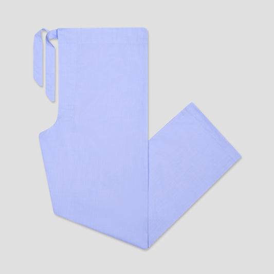 Light blue pyjama bottoms on a light gray background