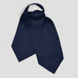 Small Spot Foulard Silk Cravat in Navy and Sky on plain pale grey background