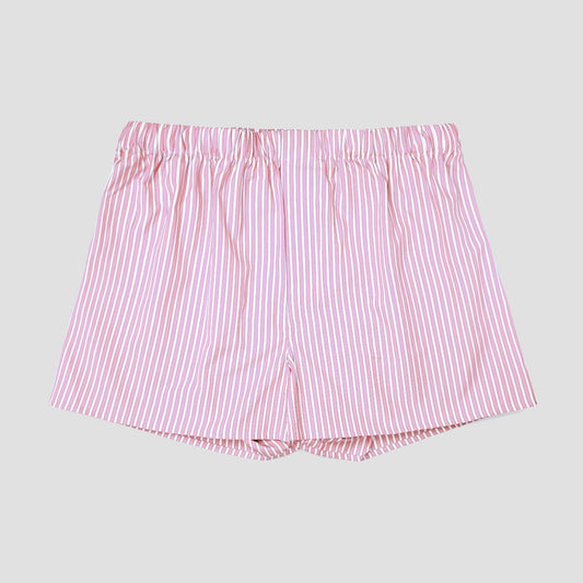 Pink and white vertically striped cotton shorts with an elastic waistband, shown flat against a light gray background.