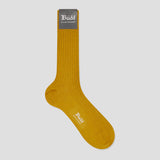 A single mustard yellow ribbed crew sock with a gray cuff label and white 'Budd' branding, shown on a light gray background.