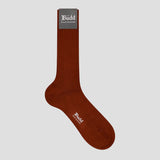 A single brown ribbed crew sock with a gray brand tag at the cuff and white 'Budd' branding printed on the foot, shown against a light gray background.