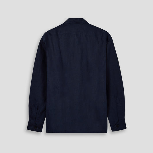 Navy blue shirt on a light gray background back shot