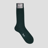 A single dark forest green ribbed crew sock with a gray brand label at the cuff and white 'Budd' branding on the toe, shown against a solid light gray background.