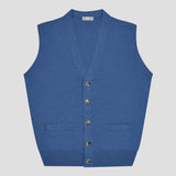 Blue knitted waistcoat vest with brown buttons up the front, on plain pale grey background