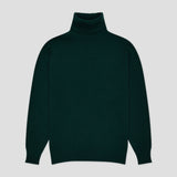 Green cashmere roll neck sweater on plain grey background