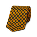 Yellow gold coloured medallion wool tie
