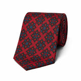 Authentic madder silk tie in red with bold geometric design
