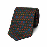 Green madder silk tie with blue and gold floral motif
