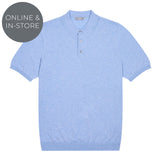 Light blue polo shirt on a white background with 'Online & In-Store' text.