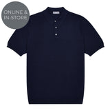 Navy blue polo shirt on a white background with 'Online & In-Store' text.