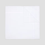 A white square cotton pocket square displayed flat against a light gray background.
