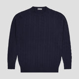 A dark navy blue cable-knit crewneck sweater displayed flat against a light gray background.