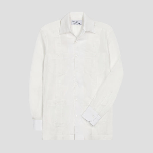 A white long-sleeve Guayabera shirt with button-down cuffs and a spread collar, displayed on a neutral light gray background.