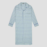 Green nightshirt with blue and green checks, navy piping and long sleeves on a plain grey background