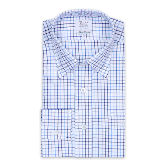 Blue checkered dress shirt on a white background