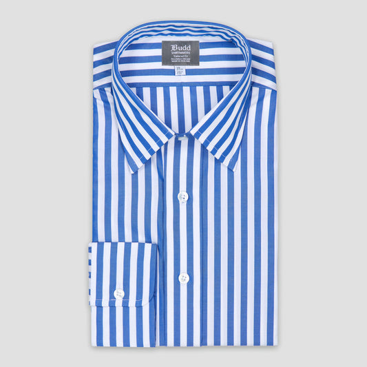 A folded blue and white striped dress shirt with a pointed collar, white buttons, and a single-button cuff, displayed on a light gray background. The brand label inside the collar reads 'Budd'.