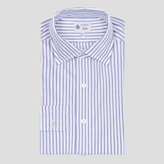 A folded long-sleeve dress shirt with vertical blue and white stripes, featuring a classic collar, white buttons, and a single buttoned chest pocket, displayed on a solid light gray background.
