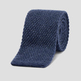 Luxurious Prussian blue knitted tie crafted from soft, textured pure cashmere in a classic flat-end design.