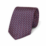 Navy blue tie with red and white geometric pattern on a white background
