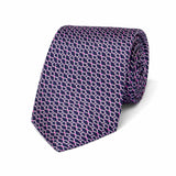 Navy blue tie with pink geometric pattern on a white background