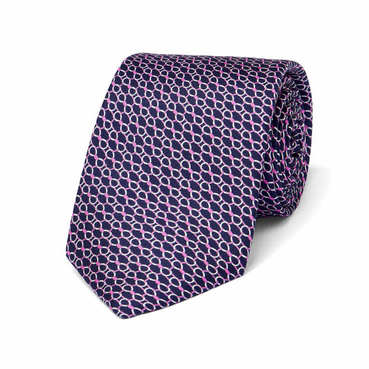 Navy blue tie with pink geometric pattern on a white background