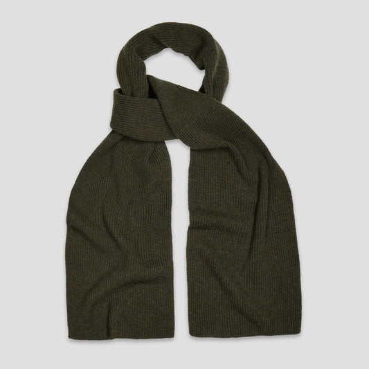 An olive green ribbed knit scarf, styled in a loop knot, displayed against a solid light gray background.