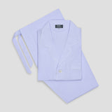 A light lavender pinstriped pajama set consisting of a folded long-sleeve button-up shirt with a collar and matching tie belt, displayed on a neutral light gray background.