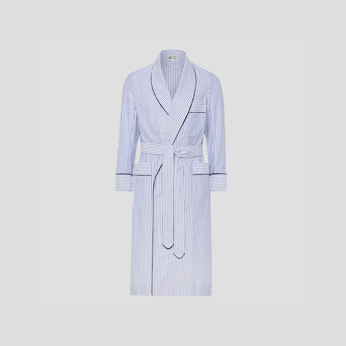 A long-sleeve bathrobe with vertical blue and white stripes, featuring a shawl collar, matching belt, and front pockets, displayed on a neutral light gray background.
