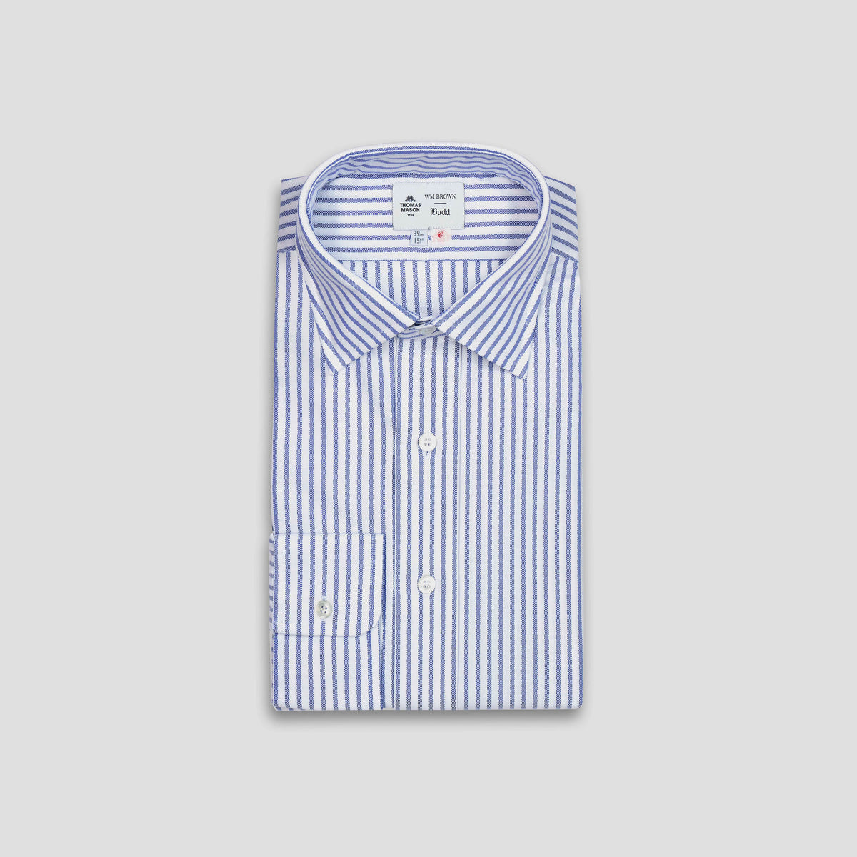 A folded long-sleeve dress shirt with vertical blue and white stripes, featuring a classic collar, button-down front, and a single chest pocket, displayed on a neutral light gray background.