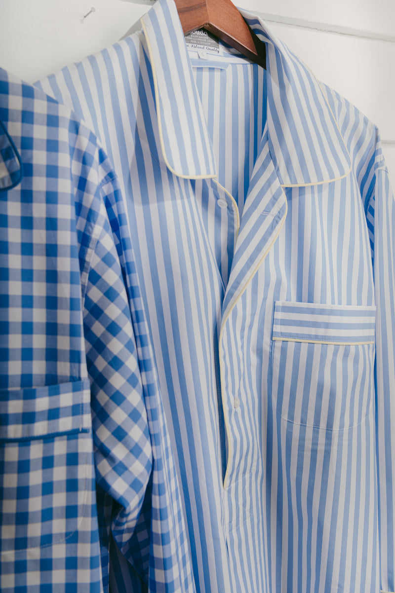 Nightshirts in blue stripe and check hung on hanger